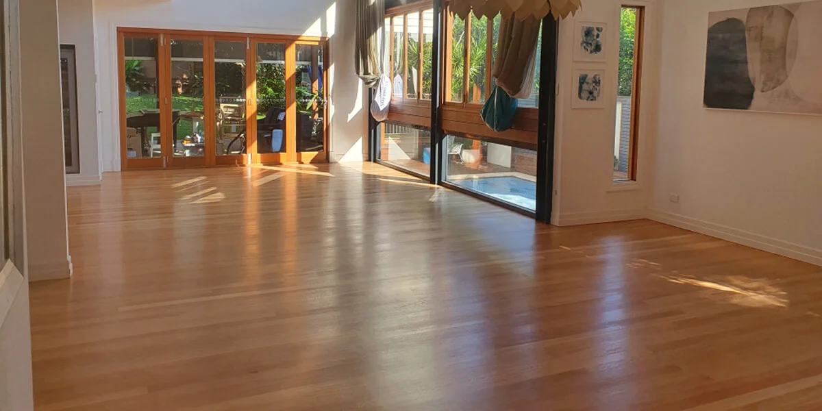 Freshly polished timber floor in a sunlit Brisbane home